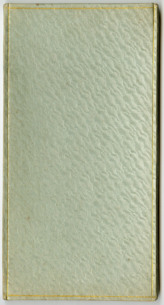 An empty textured book cover with a gold border